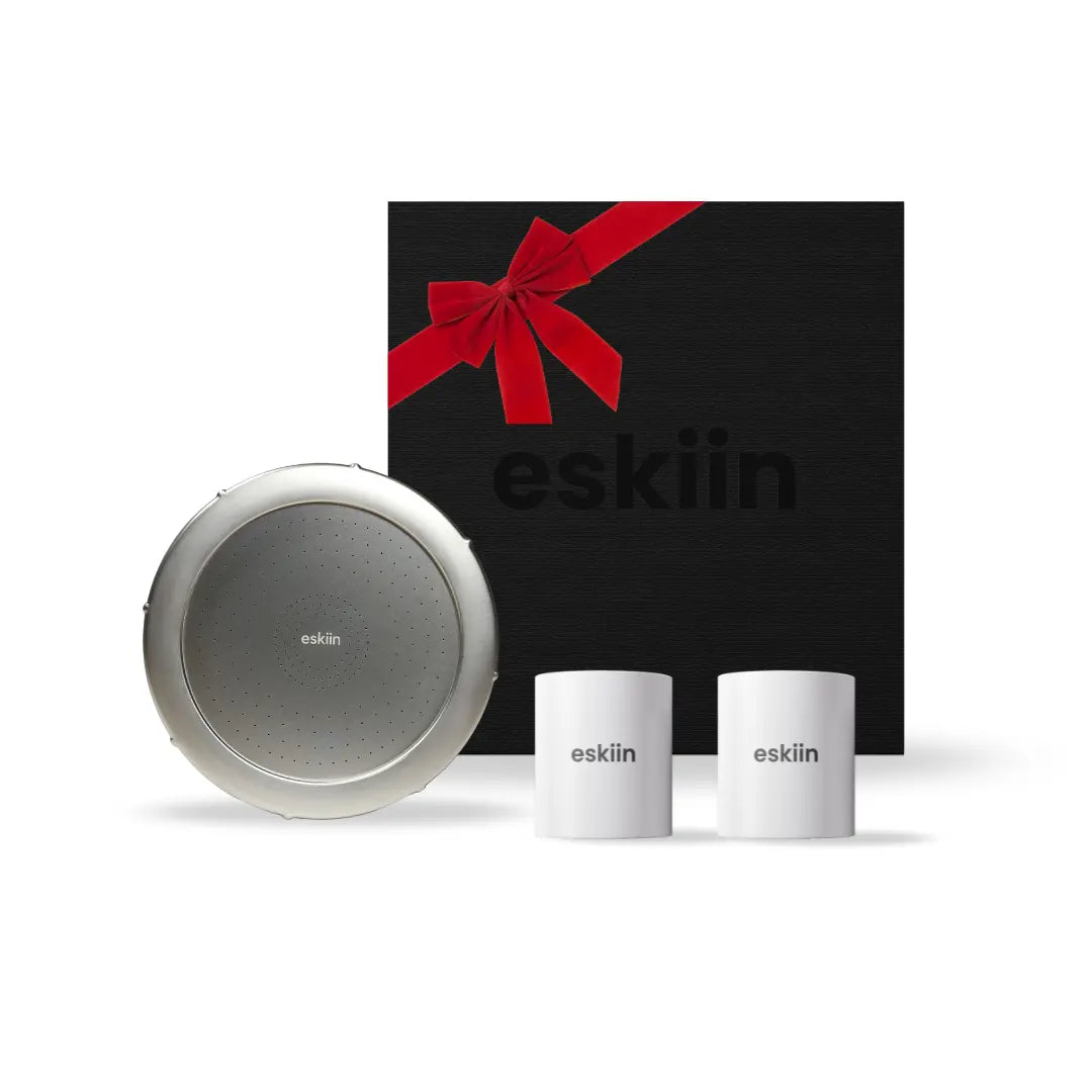 Gift set with a large round object and two cylindrical items, all labeled 'eskiin.'